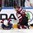 COLOGNE, GERMANY - MAY 13: Latvia's Andris Dzerins #25 gets tangled up with USA's Noah Hanifin #55 during preliminary round action at the 2017 IIHF Ice Hockey World Championship. (Photo by Andre Ringuette/HHOF-IIHF Images)

